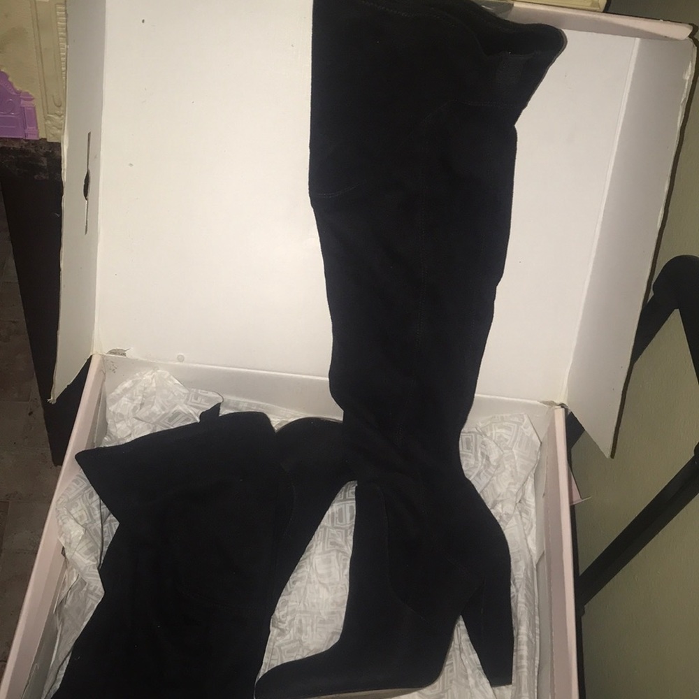 Ivanka trump thigh high boots.